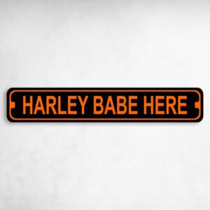 Harley Babe Here Harley Novelty Metal Street Sign to add to your sign collection.