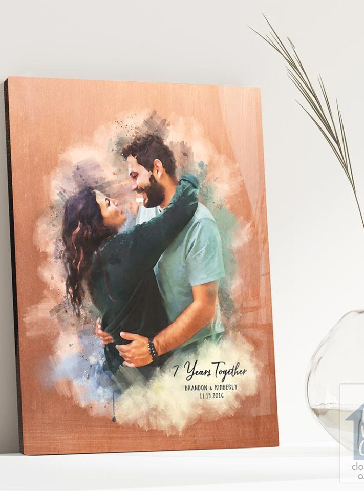 Relocation concept. A smiling cheerful multiracial couple in embraces lookin in each other eyes Relocation concept. A smiling cheerful multiracial couple in embraces lookin in each other eyes