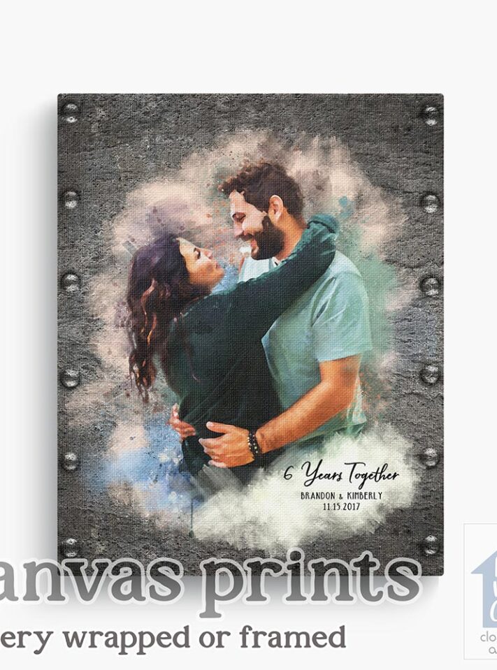 Relocation concept. A smiling cheerful multiracial couple in embraces lookin in each other eyes Relocation concept. A smiling cheerful multiracial couple in embraces lookin in each other eyes