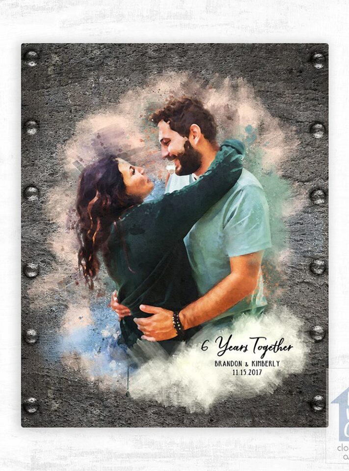 Relocation concept. A smiling cheerful multiracial couple in embraces lookin in each other eyes