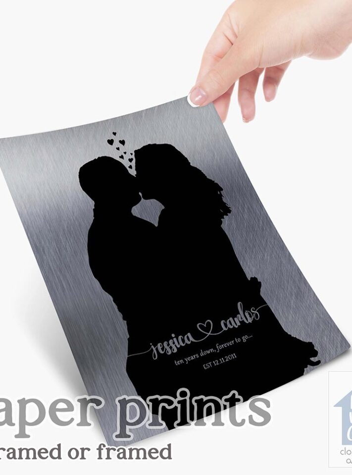 Relocation concept. A smiling cheerful multiracial couple in embraces lookin in each other eyes Relocation concept. A smiling cheerful multiracial couple in embraces lookin in each other eyes