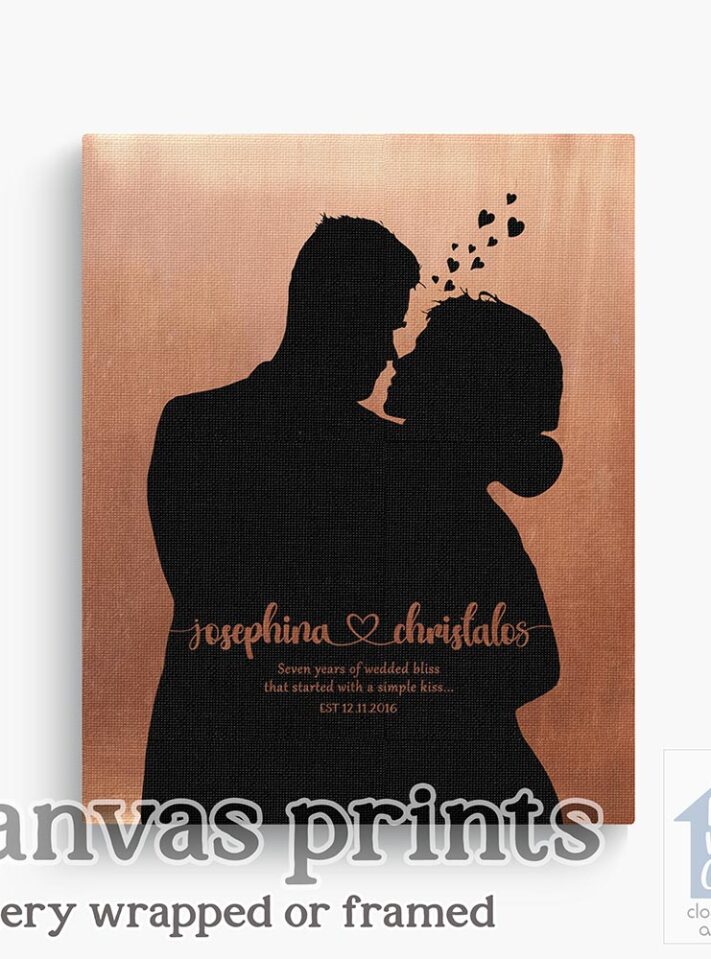 Relocation concept. A smiling cheerful multiracial couple in embraces lookin in each other eyes Relocation concept. A smiling cheerful multiracial couple in embraces lookin in each other eyes