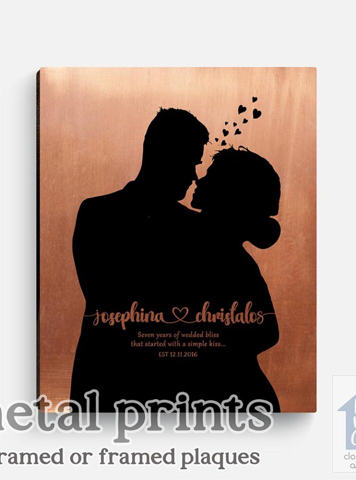 Relocation concept. A smiling cheerful multiracial couple in embraces lookin in each other eyes Relocation concept. A smiling cheerful multiracial couple in embraces lookin in each other eyes