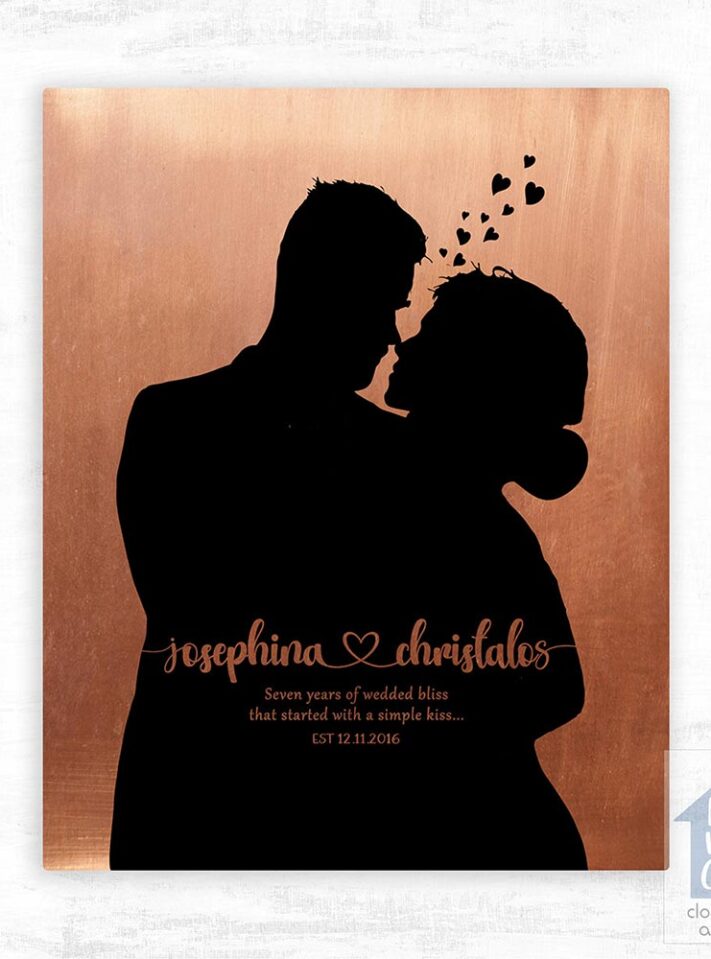 Relocation concept. A smiling cheerful multiracial couple in embraces lookin in each other eyes