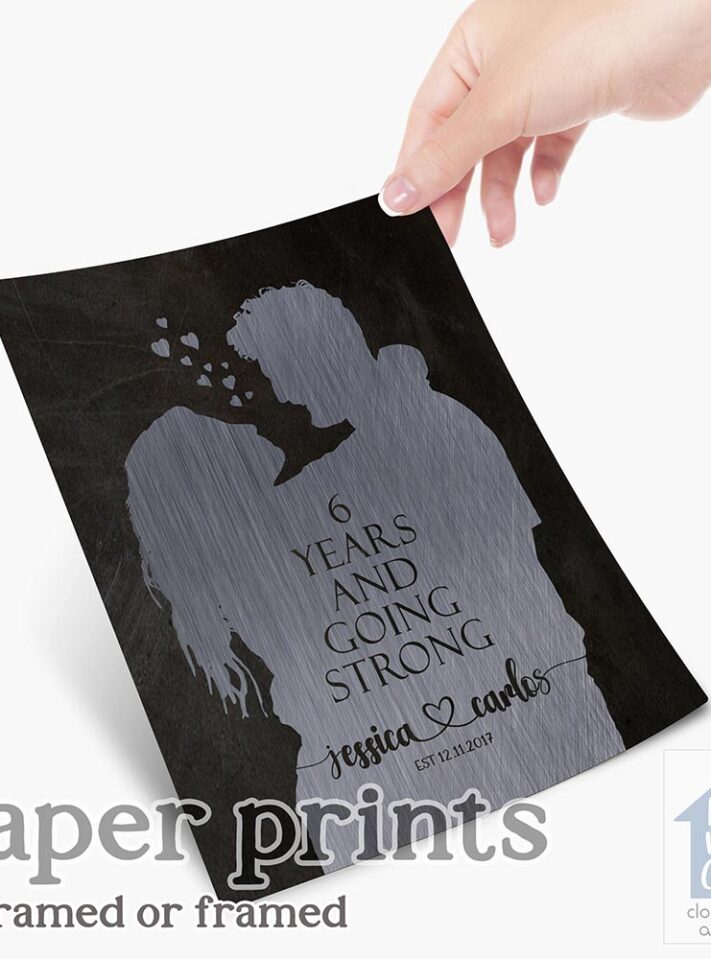 Relocation concept. A smiling cheerful multiracial couple in embraces lookin in each other eyes Relocation concept. A smiling cheerful multiracial couple in embraces lookin in each other eyes