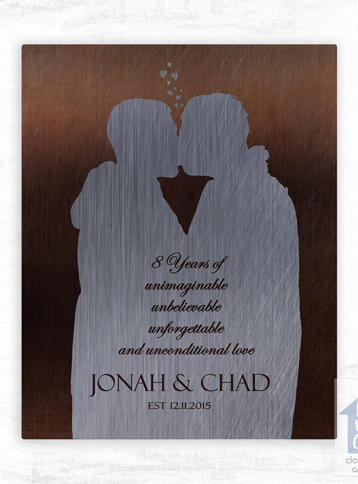 Relocation concept. A smiling cheerful multiracial couple in embraces lookin in each other eyes